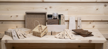 Produkte und Dienstleistungen Stiftung Bühl-Schreinerei-Rasen mit Holztisch Sitzbank Hochbeet